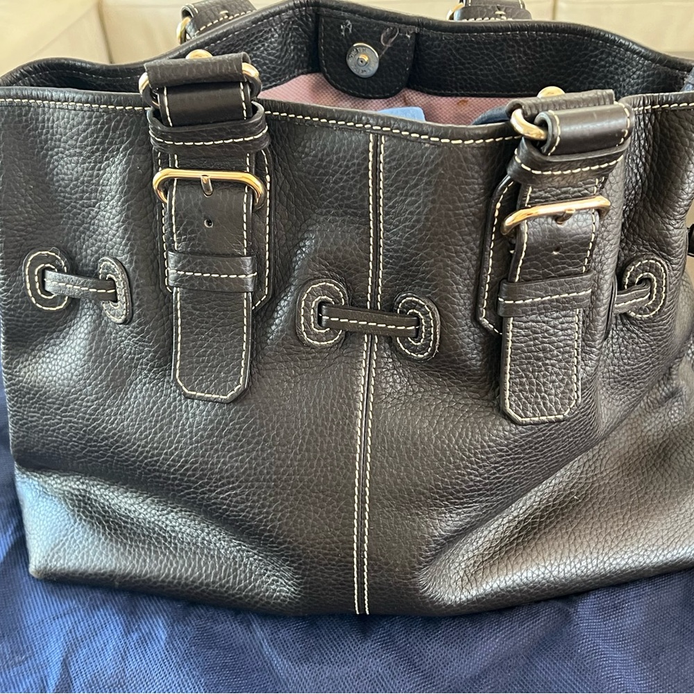 Textured Leather. Excellent condition. Interior lining  one small stain.